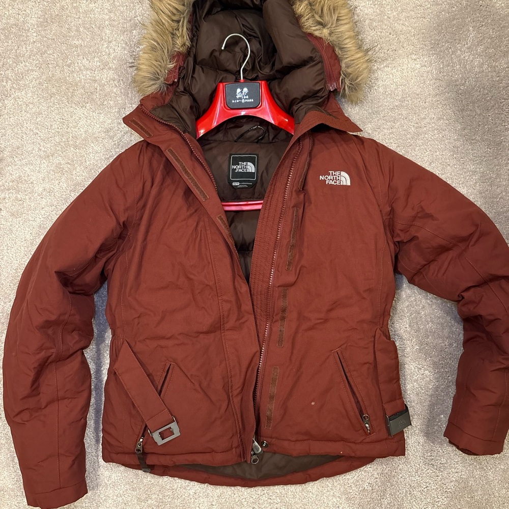 The North Face Red Backpack with Silver Buckle